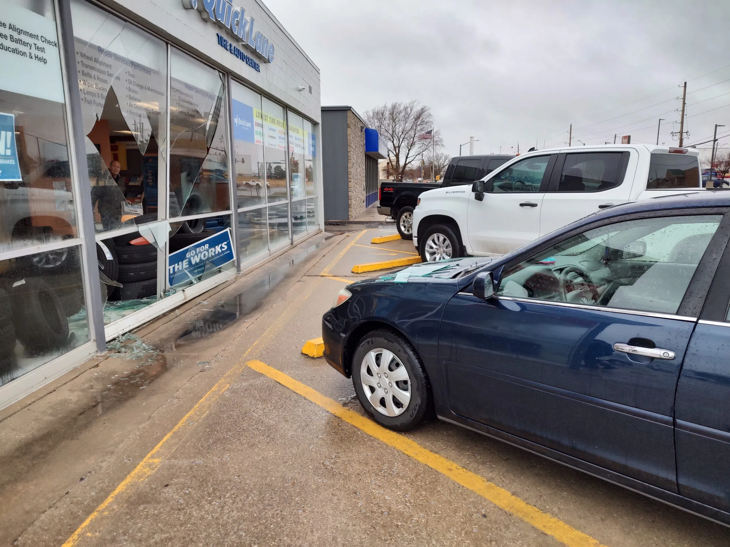 Single-vehicle accident damages west Emporia business Friday