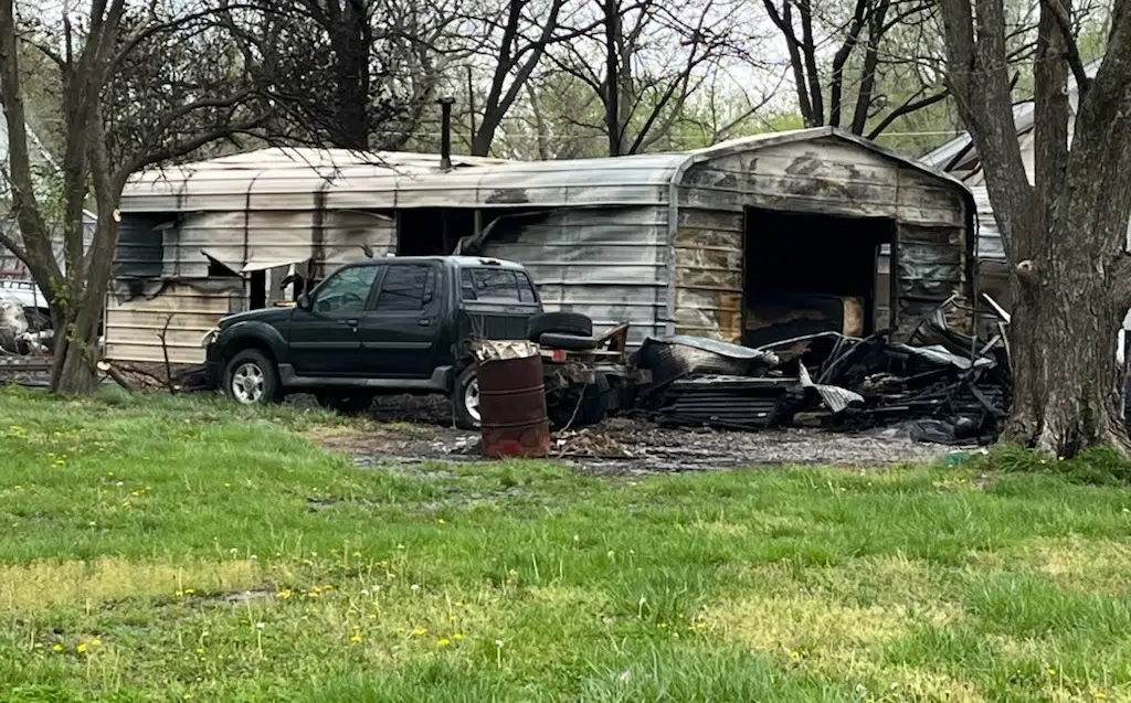 Fire destroys shop, damages carport and nearby vehicles in Lebo
