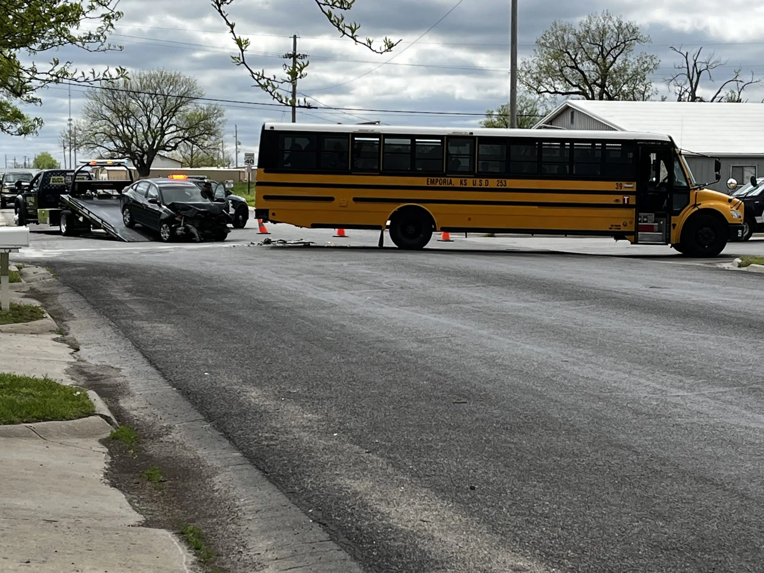 Wreck involving car, Emporia Public Schools bus causes minor injuries for car driver