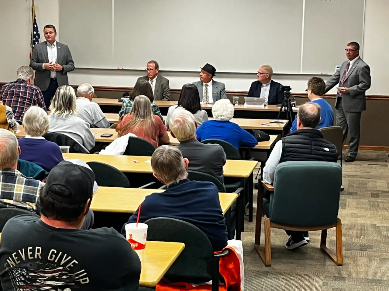 Residents fill Trusler Business Center for Chamber of Commerce Candidate Forum