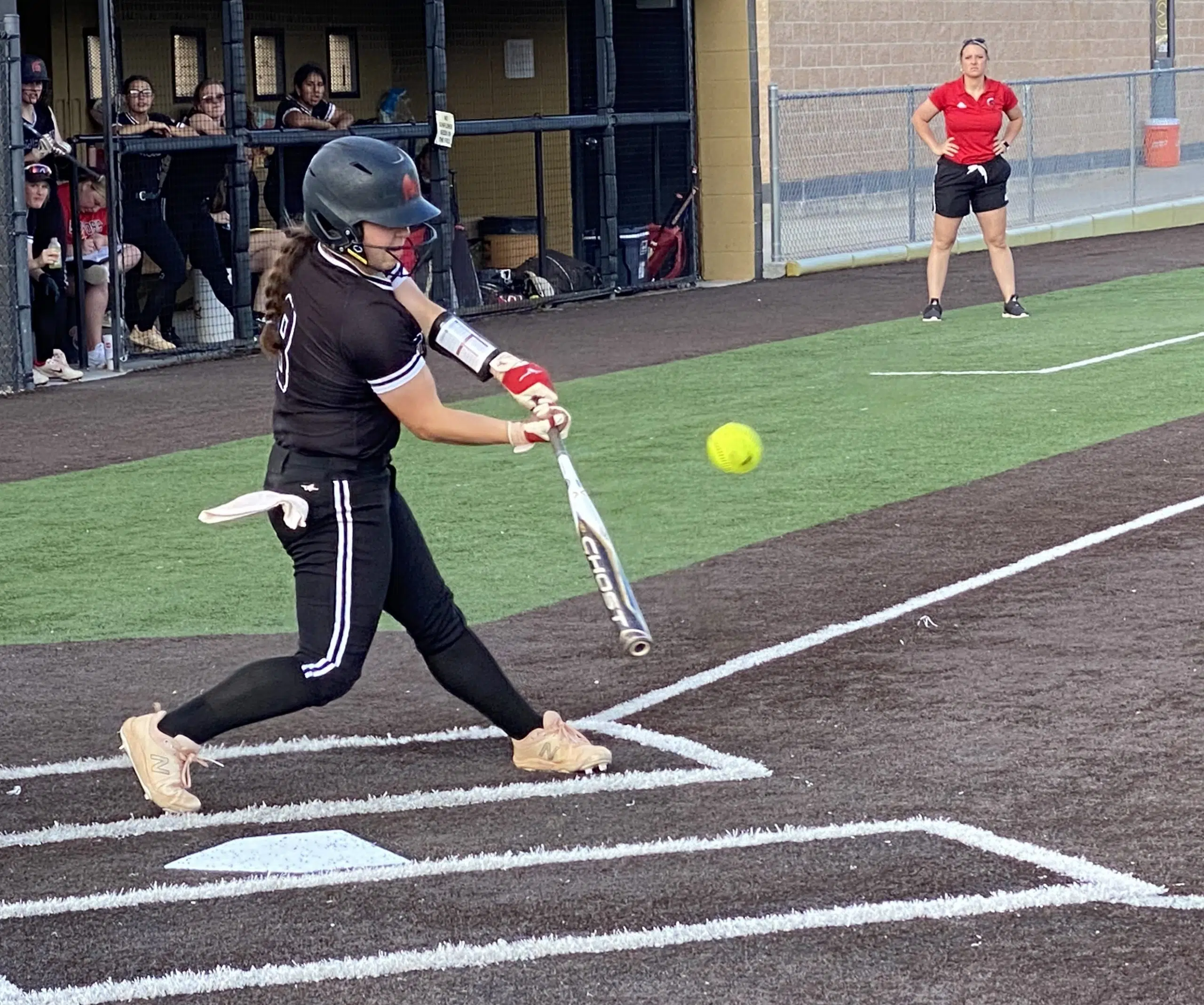 Emporia High softball splits with Iola