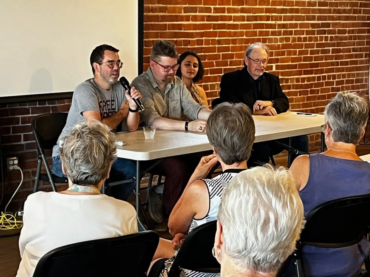 Kansas Reflector staffers discuss blurred lines between news, analysis and opinion during tour stop in Emporia