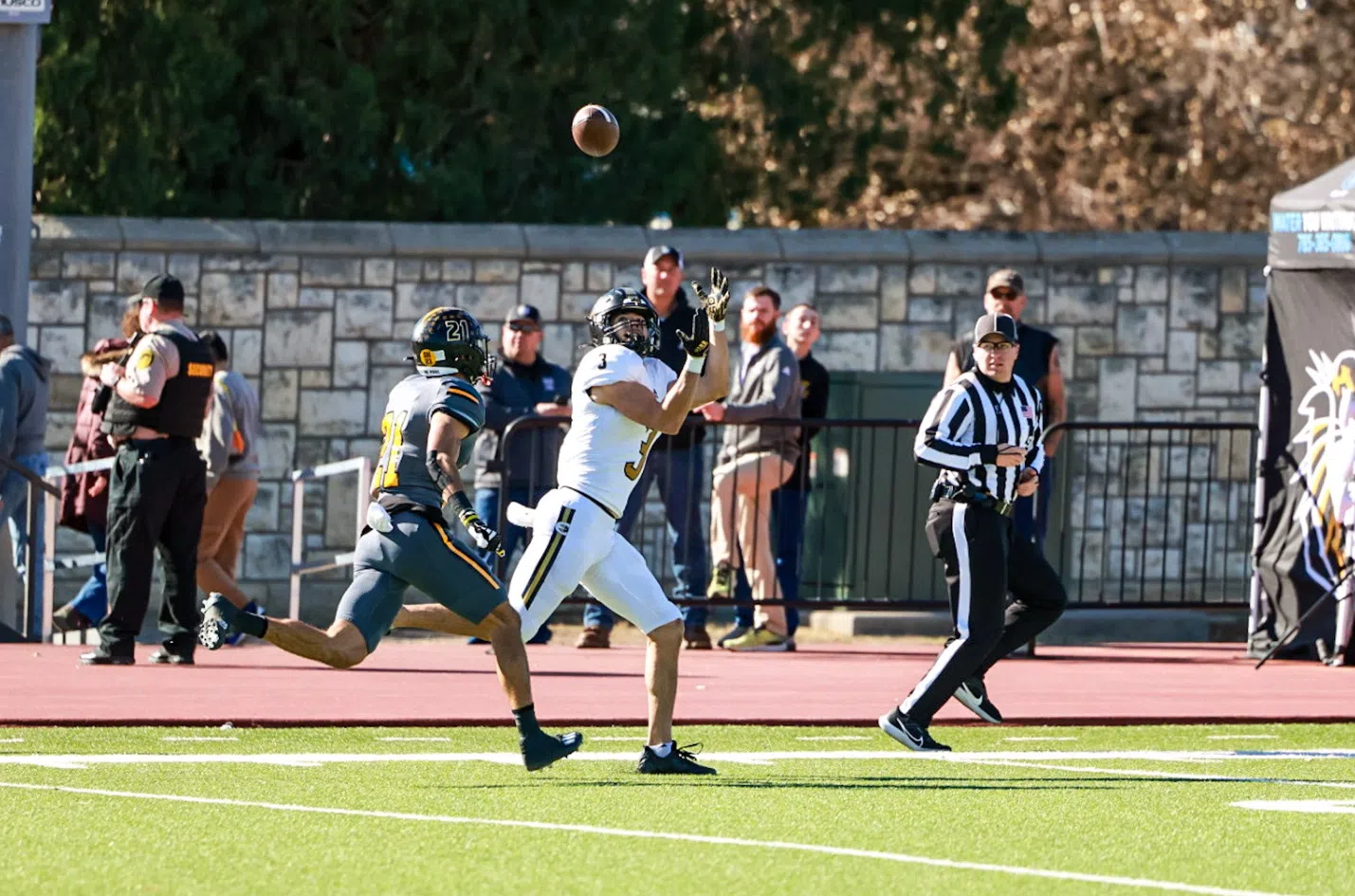 Hornets Hang On for 45-42 Victory in Hays