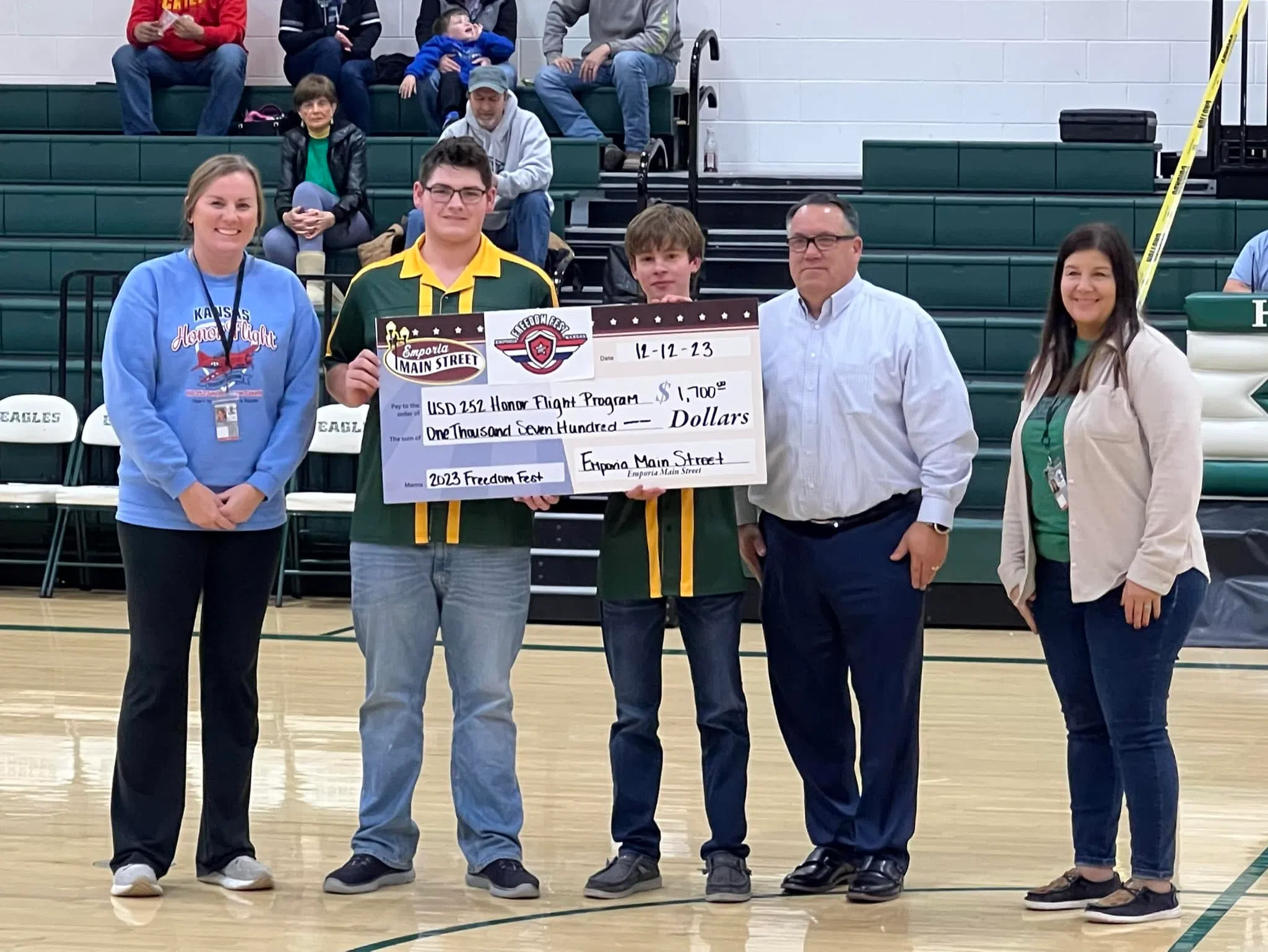 Freedom Fest Committee presents $1,700 check to USD 252 Honor Flight