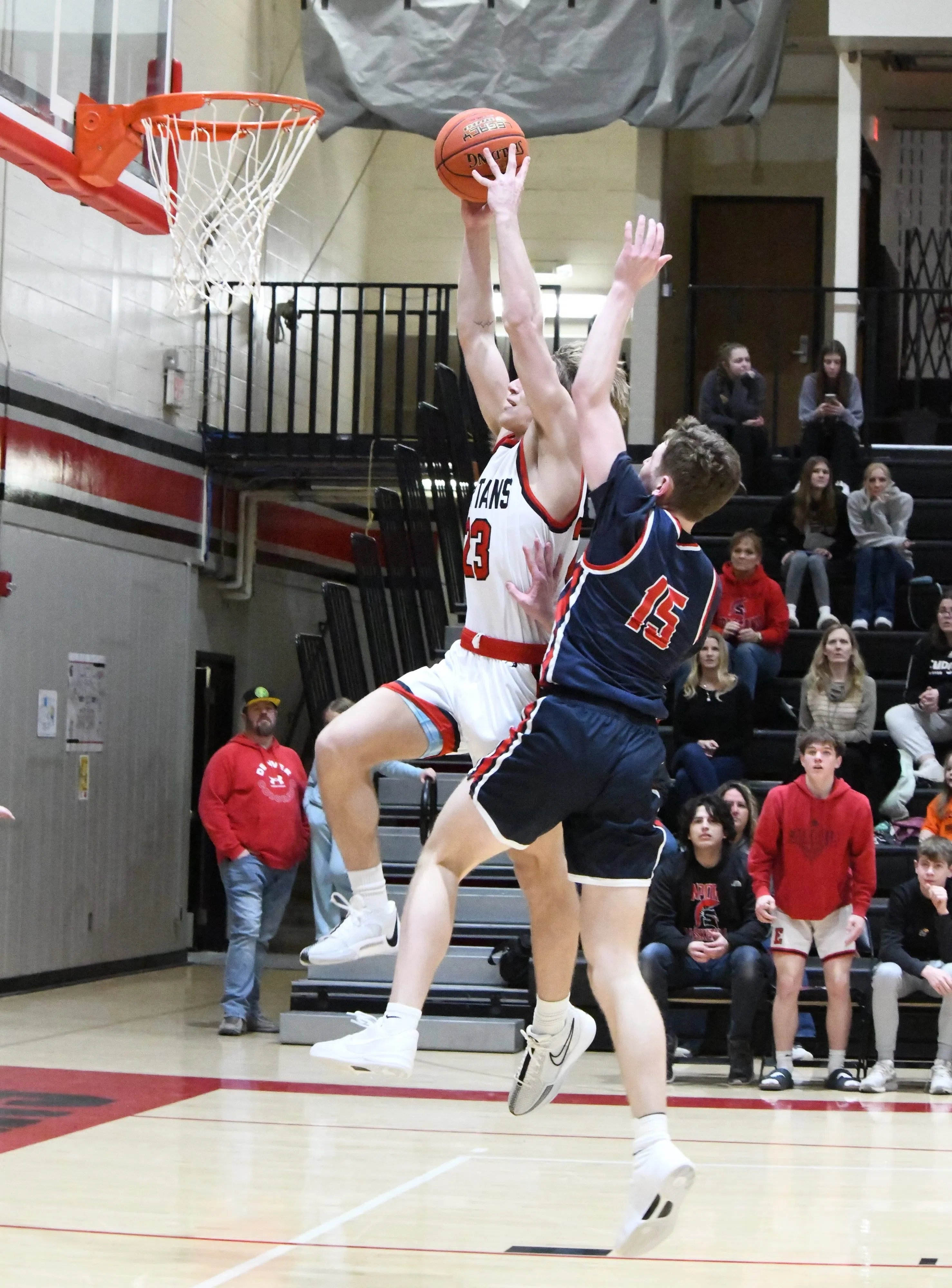 Emporia High boys use strong second half to defeat Manhattan