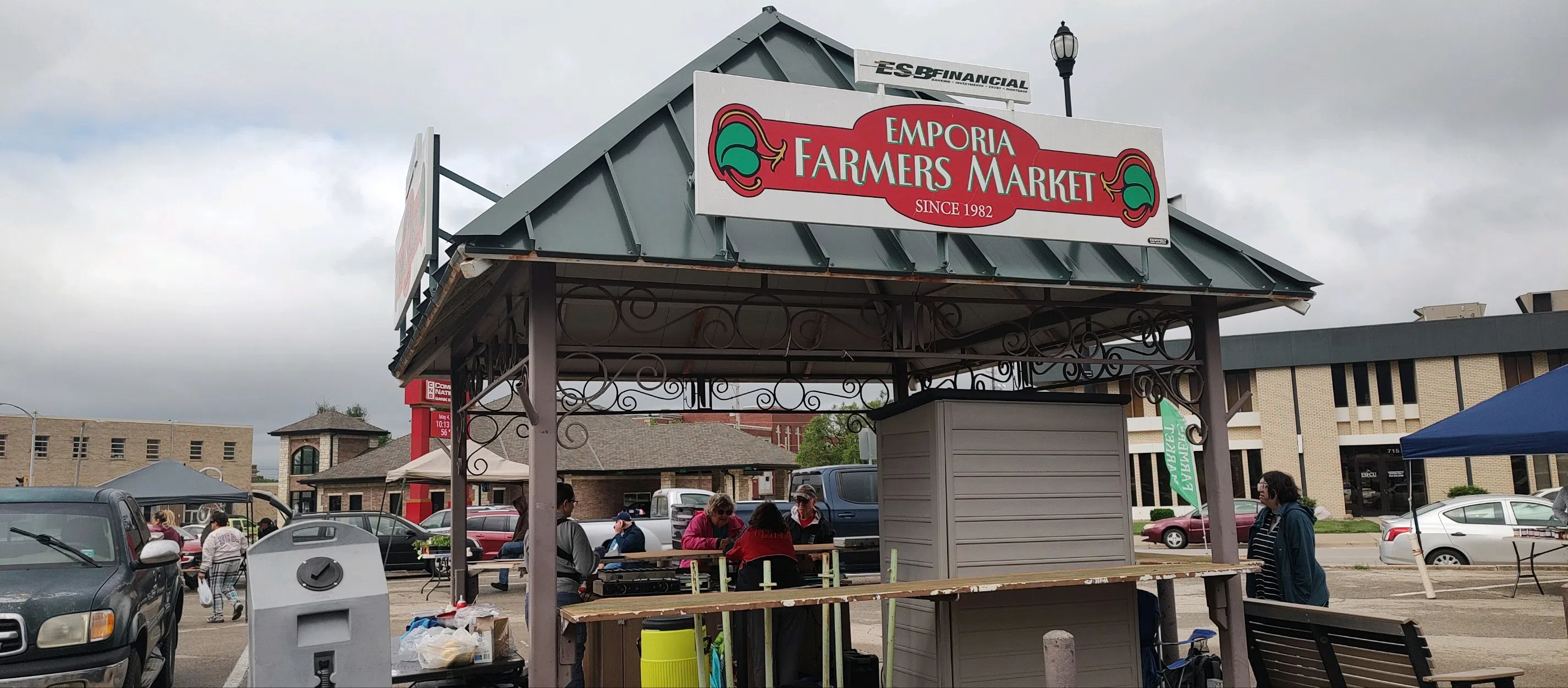 Cloudy skies and morning drizzle couldn't wash away excitement at the start of the 42nd regular Emporia Farmers Market Season