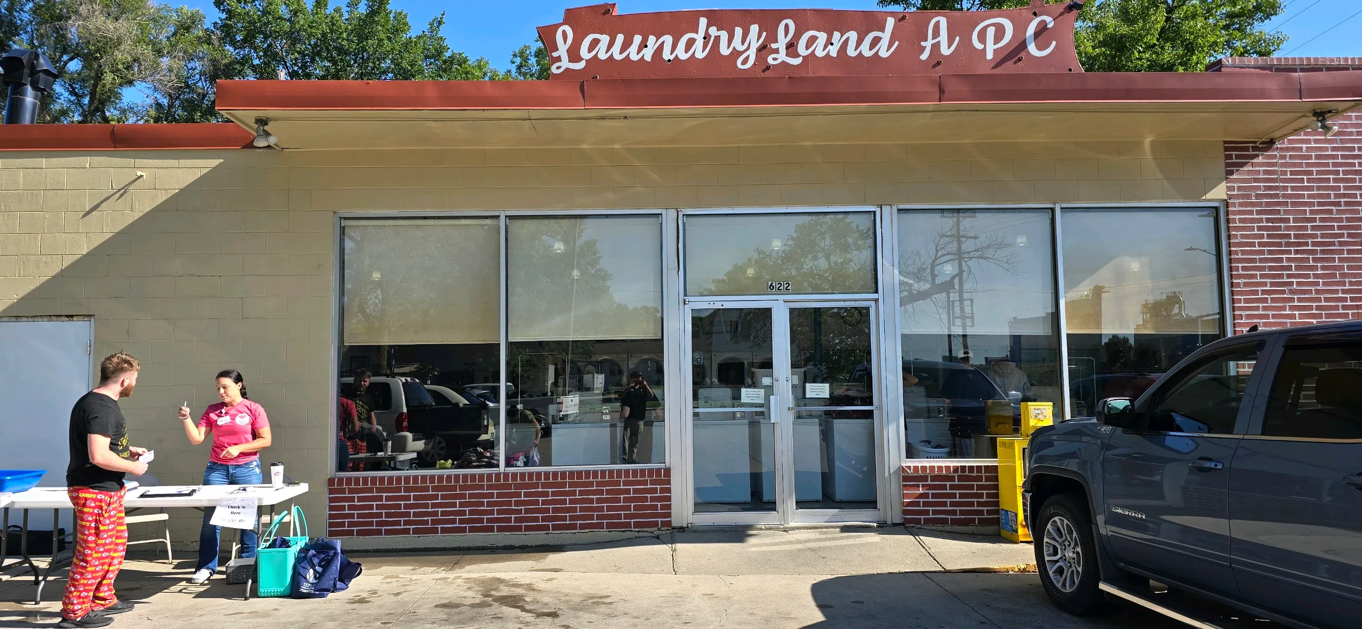 Newman Regional Health Community Care Team hosts second free laundry event Thursday