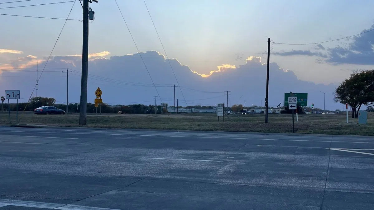 Light rain, isolated severe weather follows record high temperature