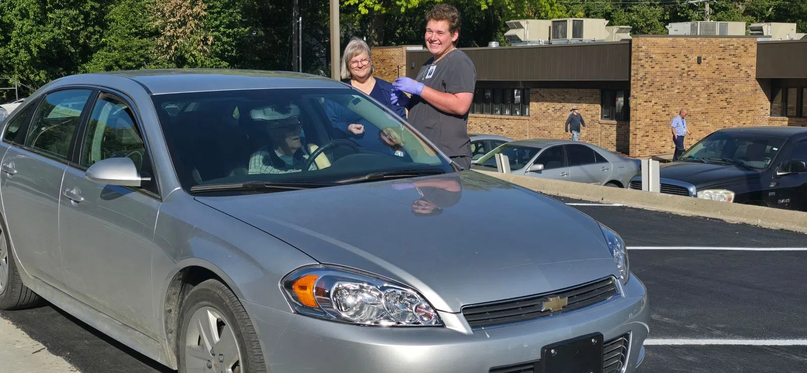 Low flu cases locally does not slow down traffic at annual CareArc drive-thru flu shot clinic Friday