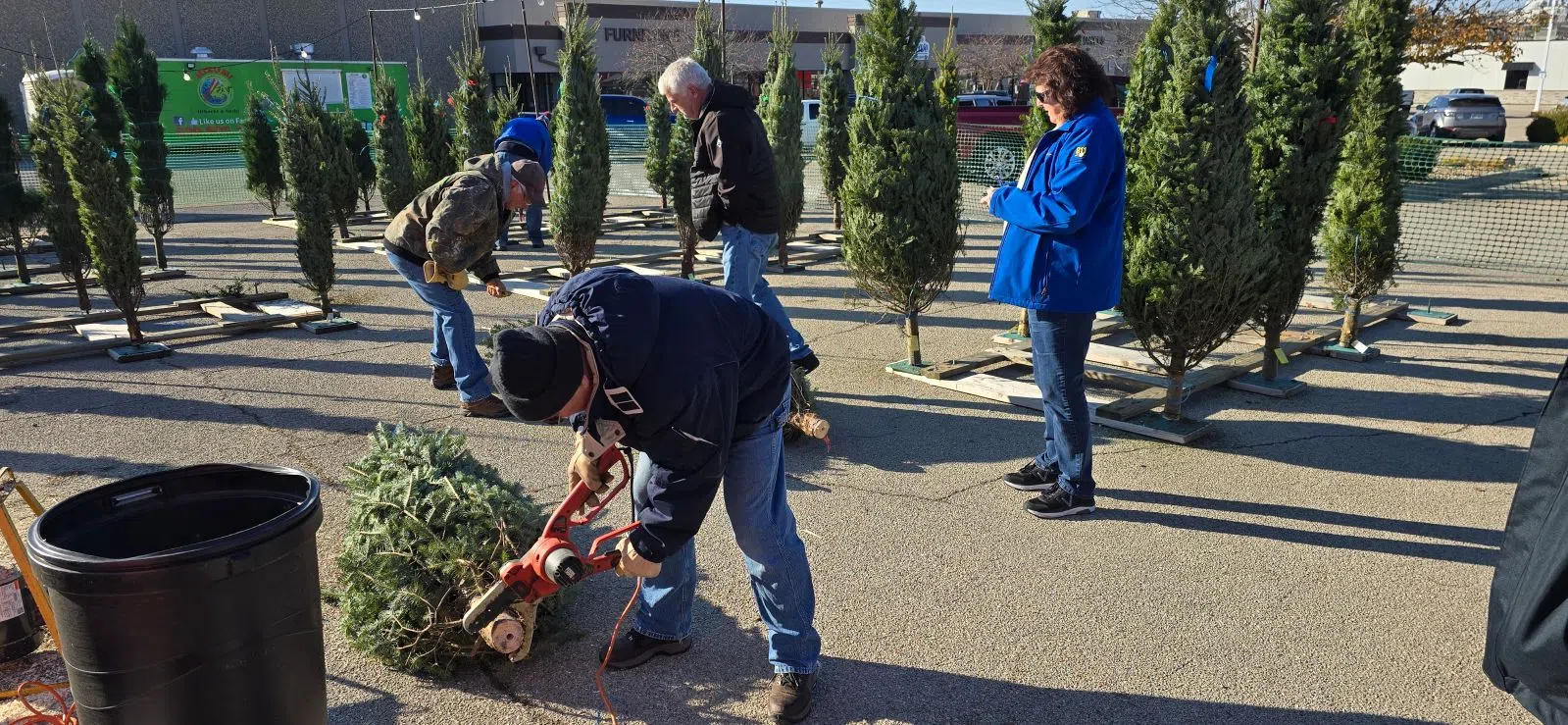 Business already booming on day one of 2024 Flint Hills Optimist Club Christmas tree lot fundraiser