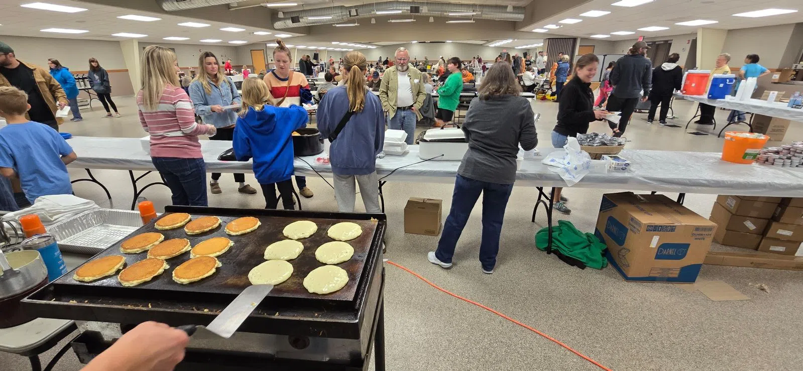 Over 600 residents stop by Anderson Building to support Emporia Christian School pancake feed Saturday