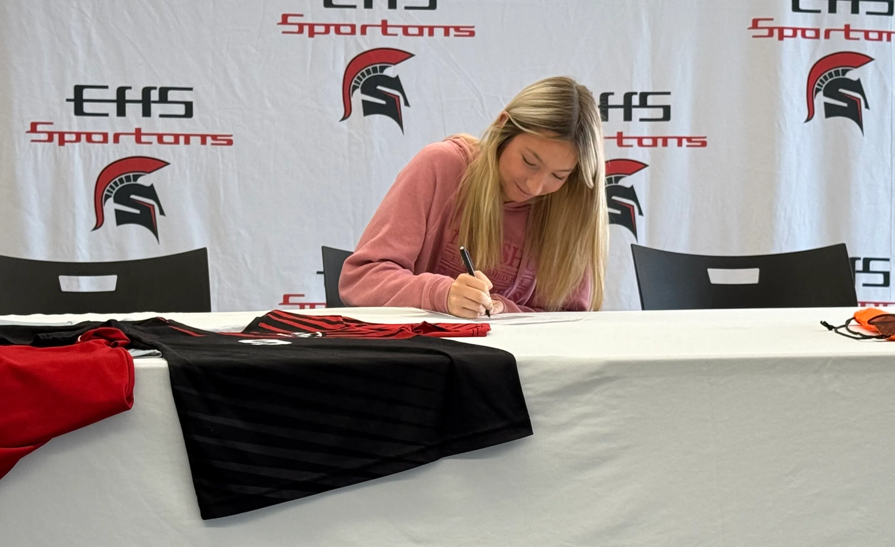 Emporia High senior Katie Smart signs with Neosho County Community College for soccer