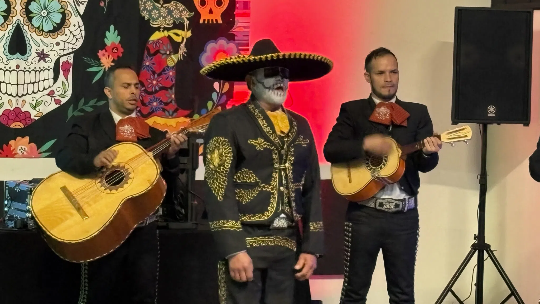 Making the best of a damp situation: Dia de los Muertos celebration moves indoors