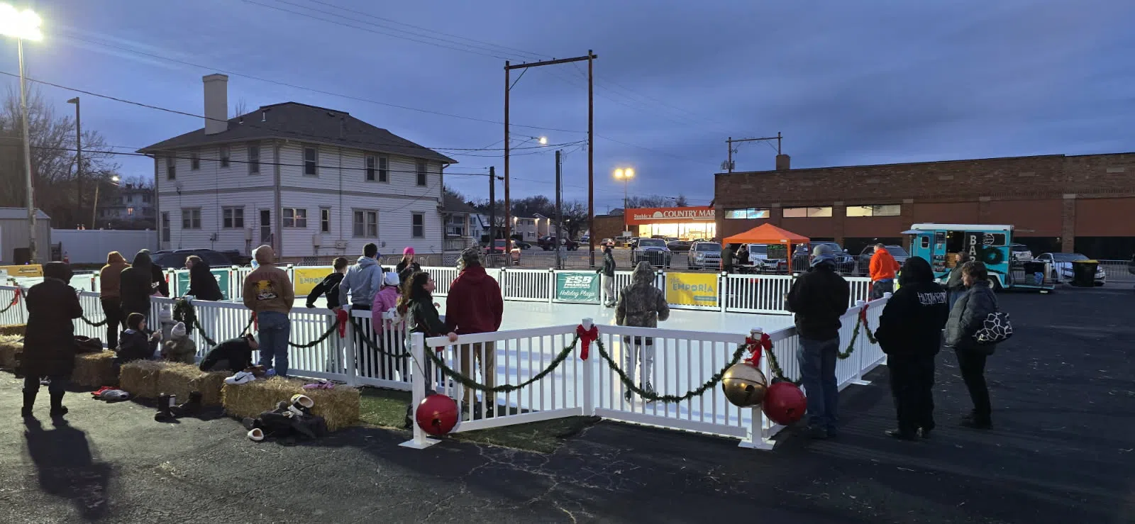 Residents make first laps around ESB Financial Holiday Plaza skating rink Friday night