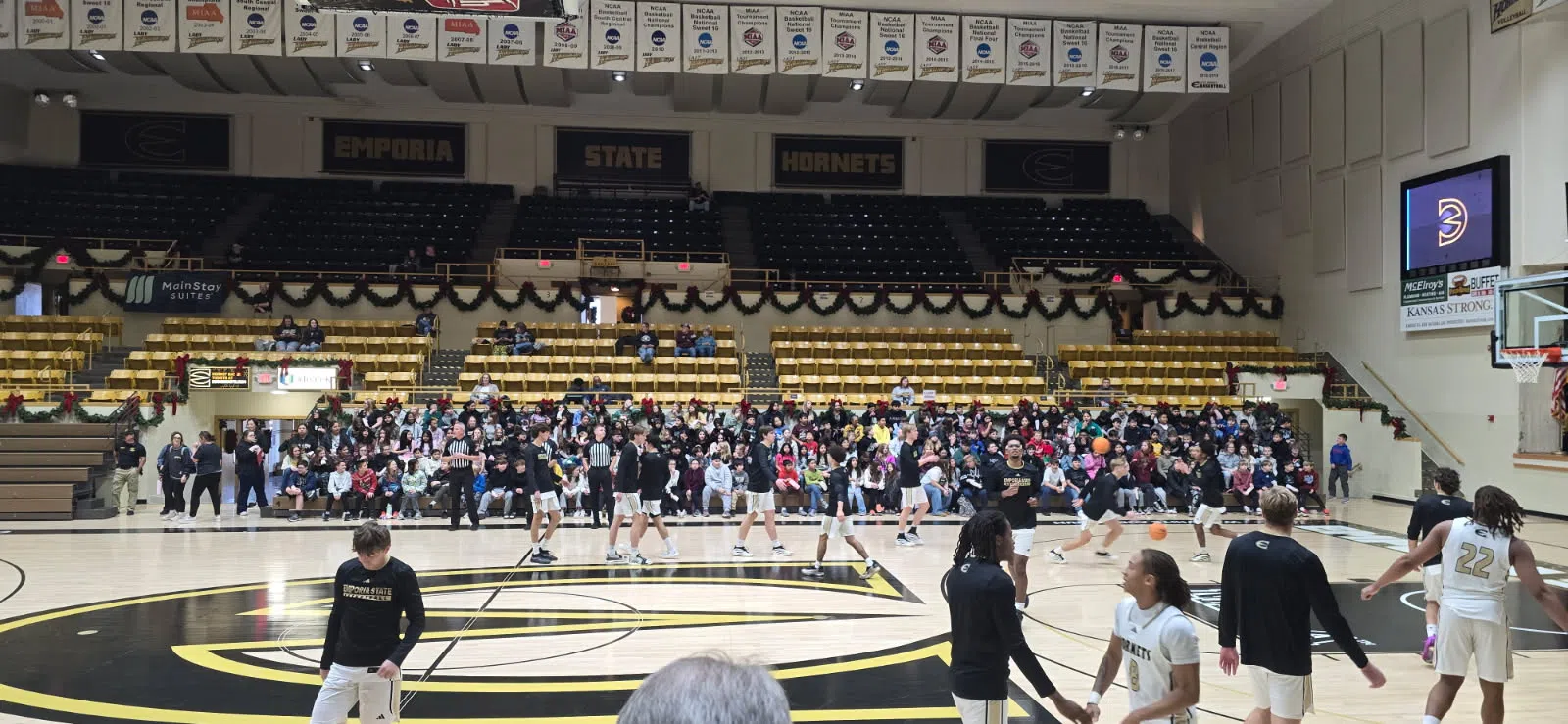 Emporia Middle School sixth graders treated to 113-60 win during second annual ESU basketball kids day game Monday