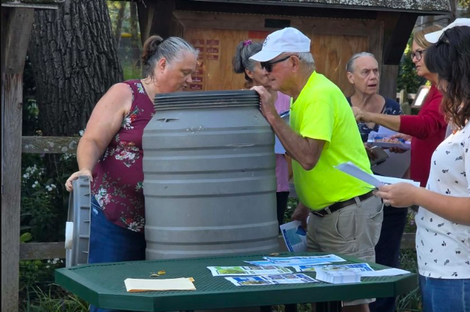 David Traylor Zoo and Natural Resource Advisory Board educate residents on how rainwater can benefit you after the storm with rain barrel workshop Saturday