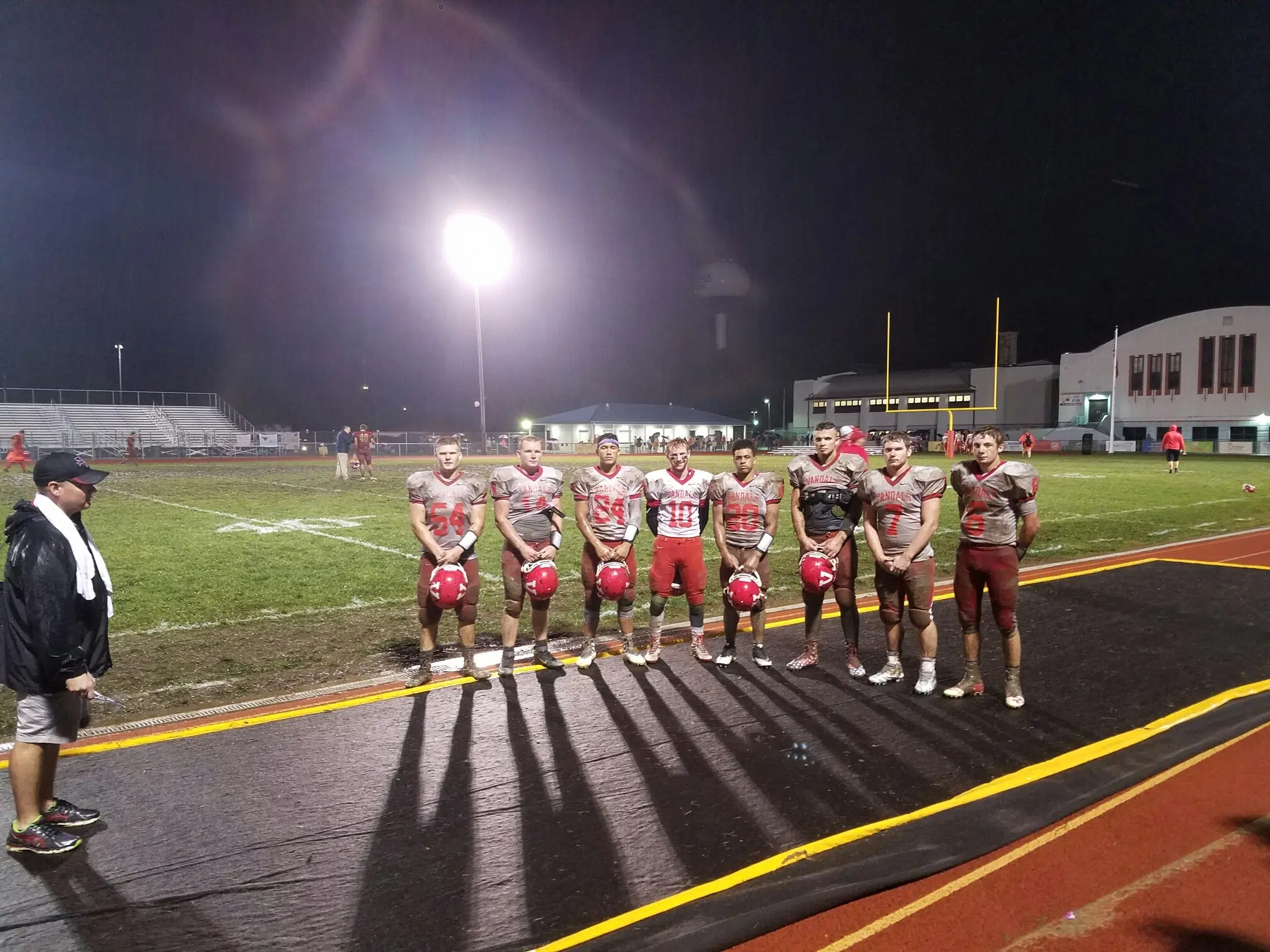 Vandals survive rain, mud, and turnovers to get win over Roxana 