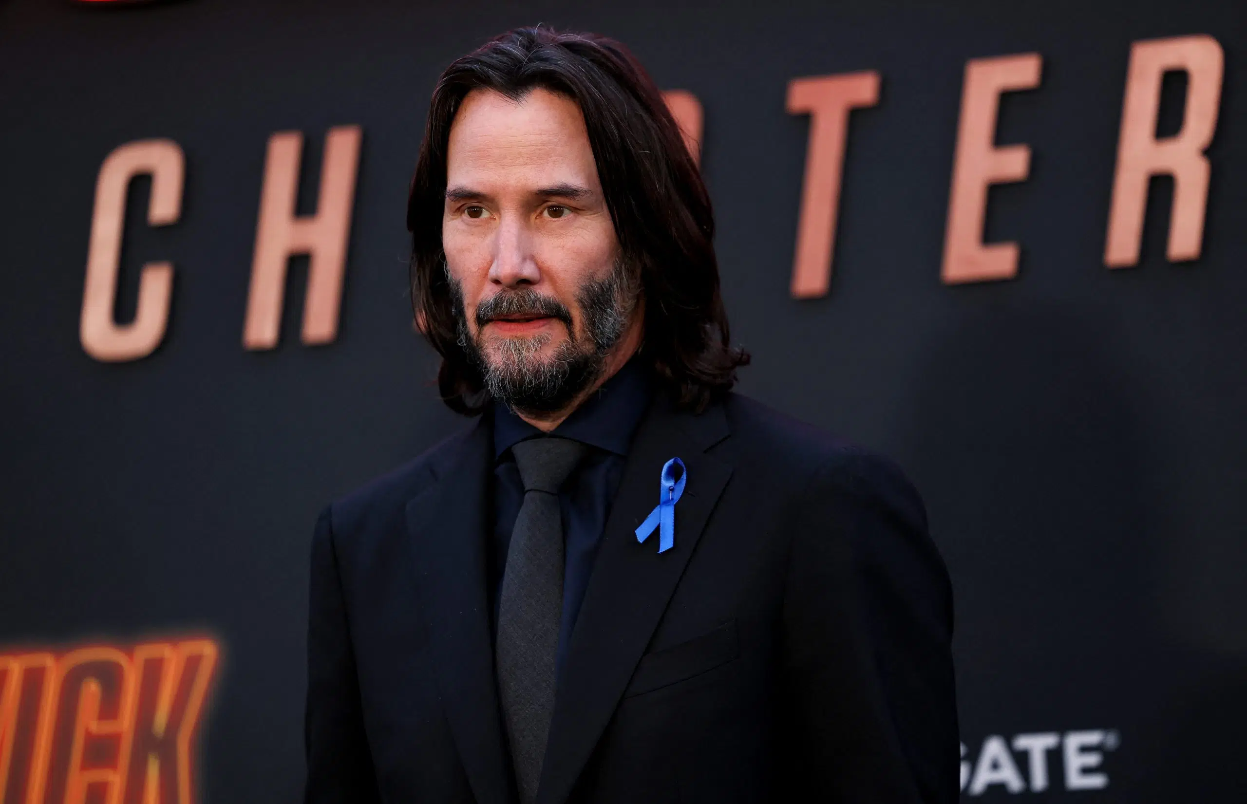 Keanu Reeves honors Lance Reddick at 'John Wick: Chapter 4' premiere