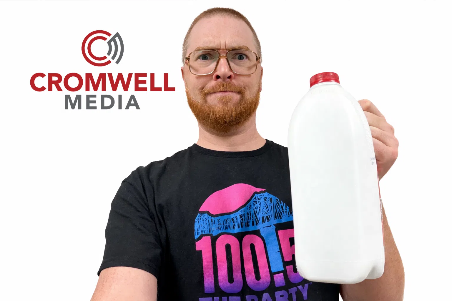 red headed man with milk