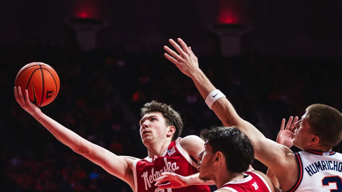 Lawrence's late 3 propels No. 23 NU to win at No. 13 Illinois