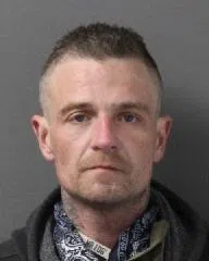 Wanted on outstanding warrant
