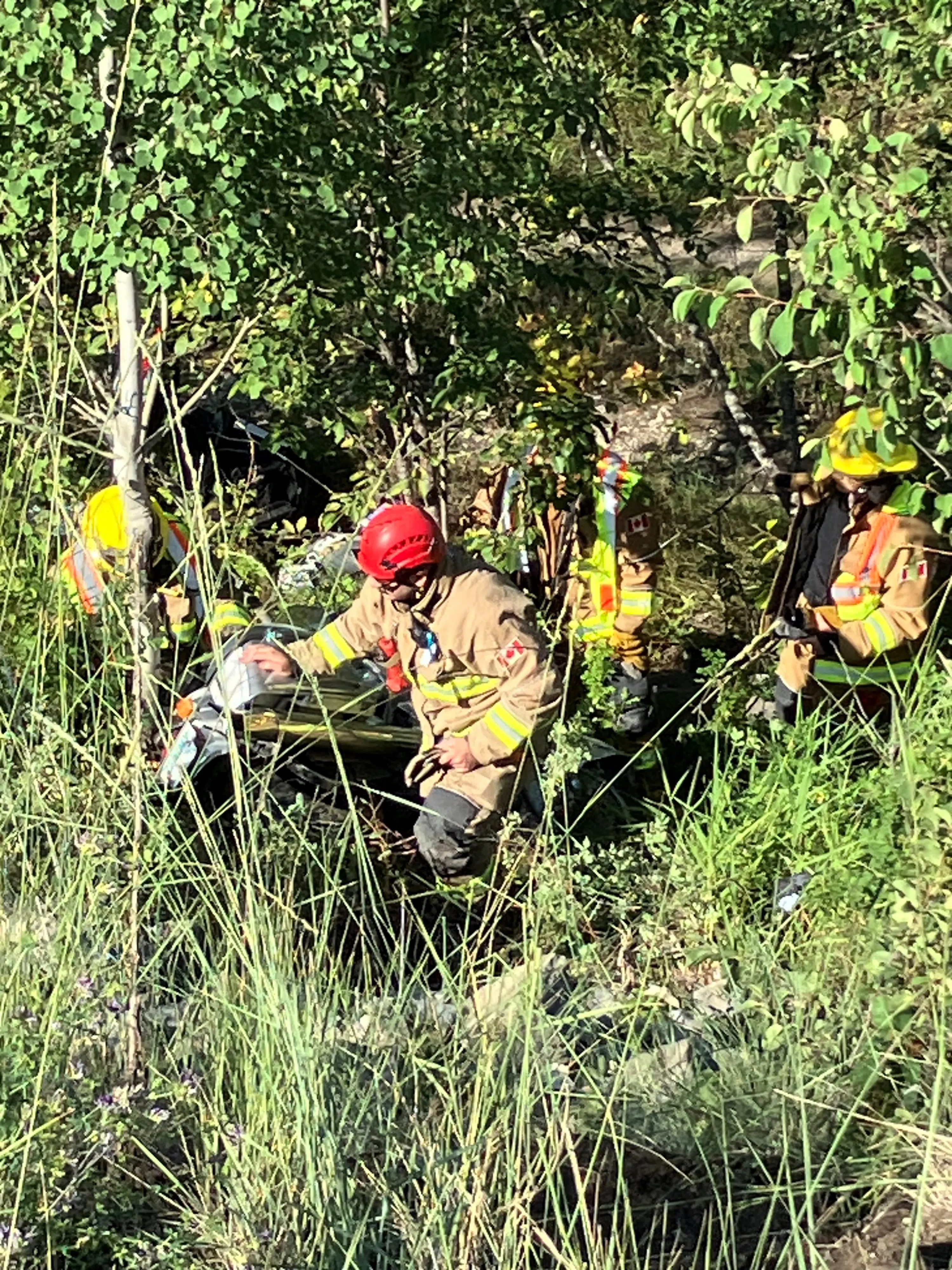 Local firefighters perform rope rescue after motorcycle crash