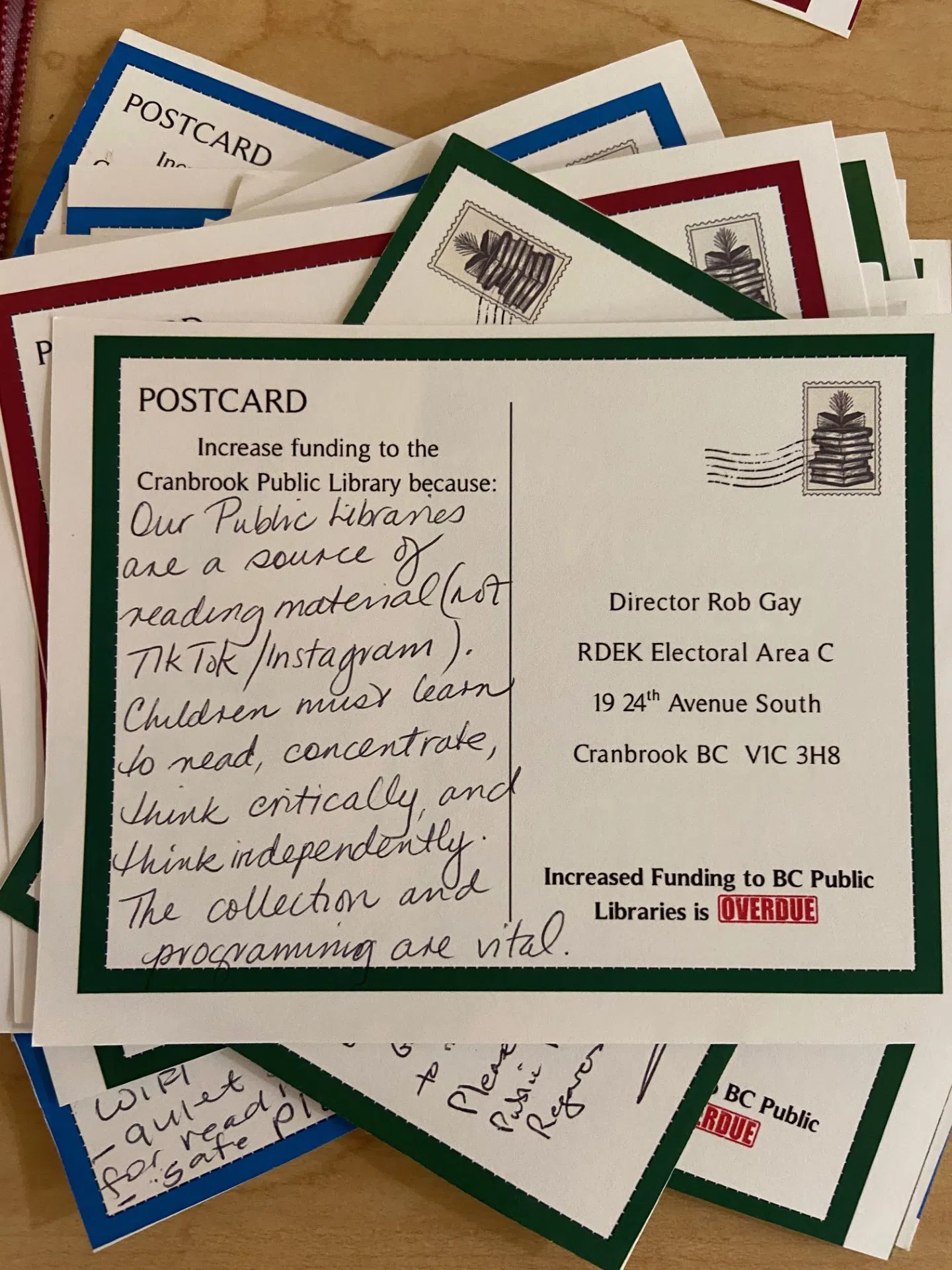Locals write almost 1,000 postcards for Cranbrook Public Library
