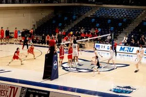 The first set winner came from the hands of MRU Cougars Outside Hitter #14 Kai Toney, as he rises over everyone to touch the ball down for the 25th point of the set.