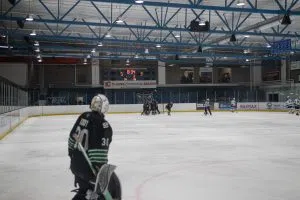 U of S goalie Jordan Koozy looks down the ice after his Huskies cut into the Cougars lead.