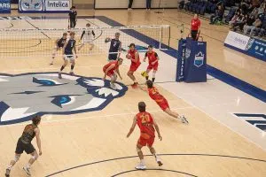 Dinos outside hitter No. 24 Will Kay saves a point with a diving dig against the MRU Cougars.