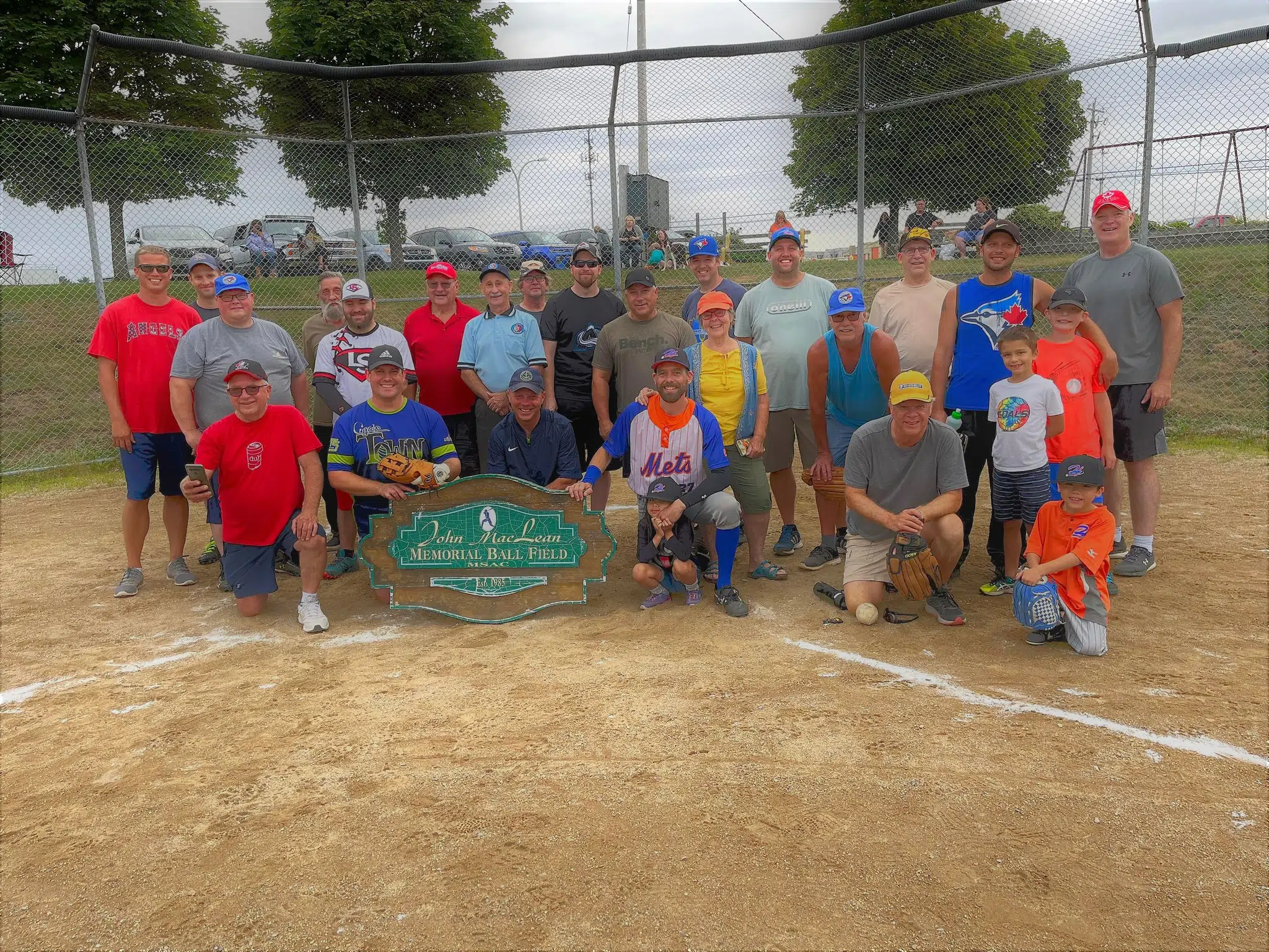 Michelin employees old and new send off company baseball field