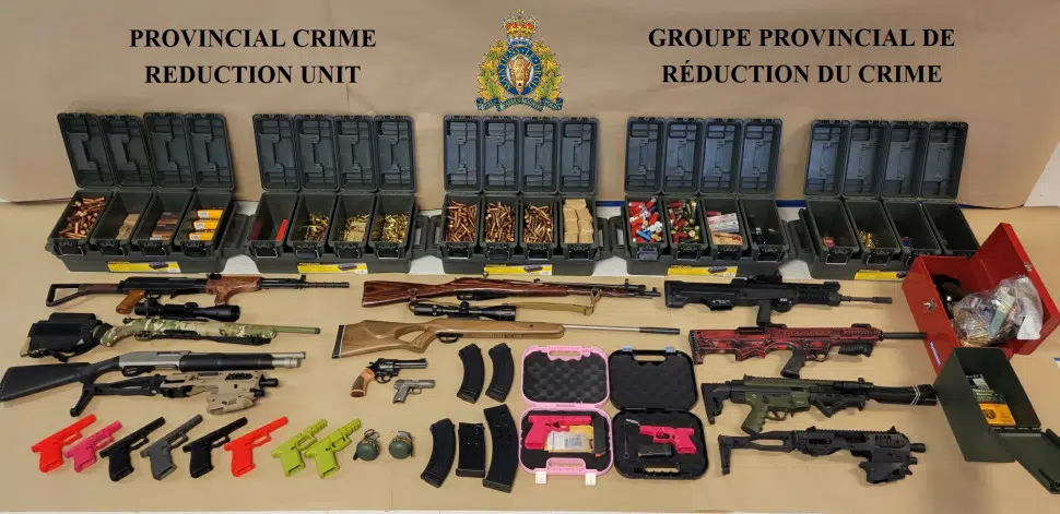 Man, woman arrested after police seize firearms, prohibited weapons