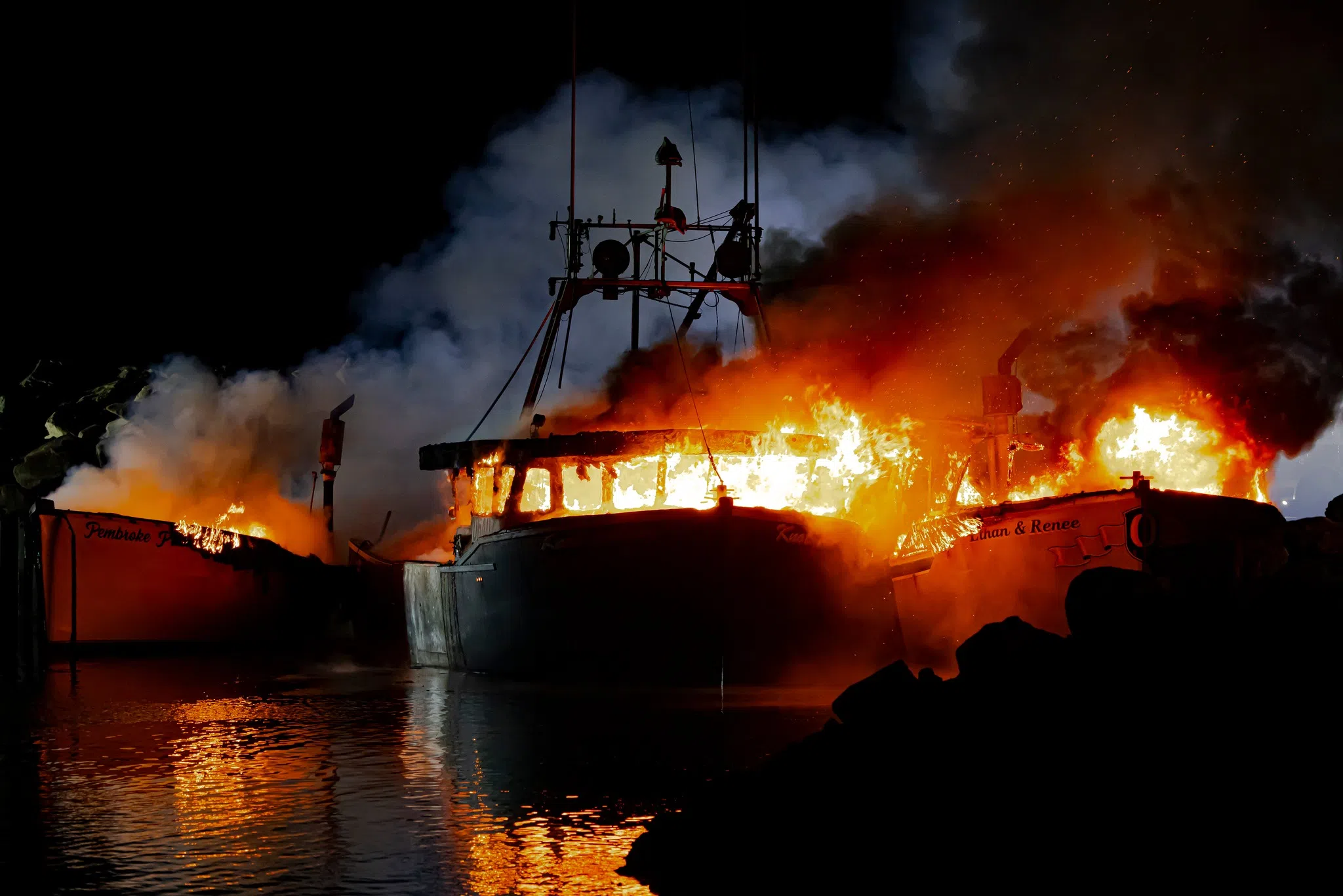 Fire destroys 3 lobster boats on Pembroke wharf