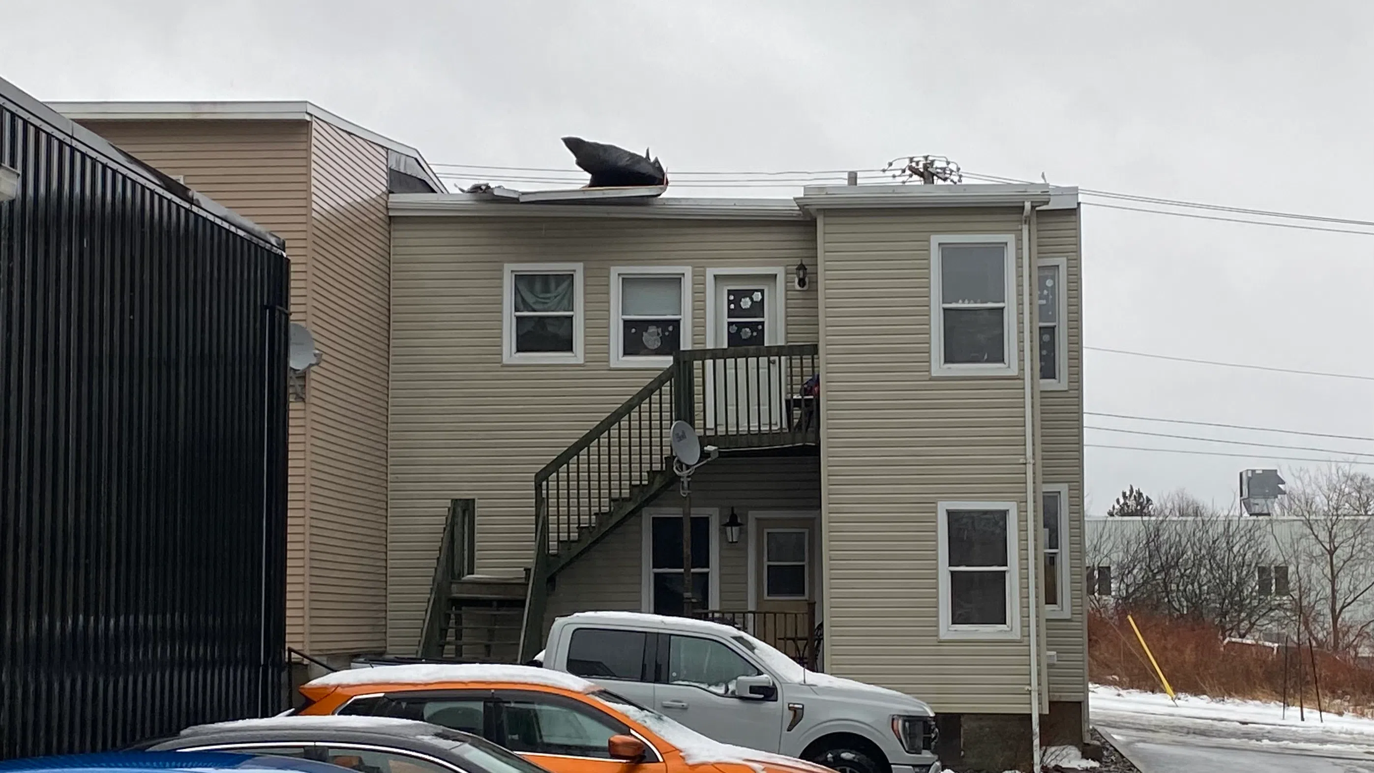 VIDEO: High winds damage roof in Saint John