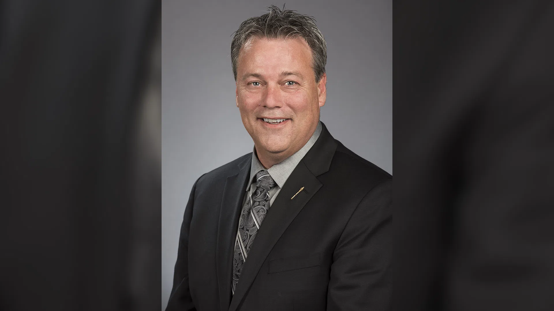 Mike Holland resigns as minister, MLA
