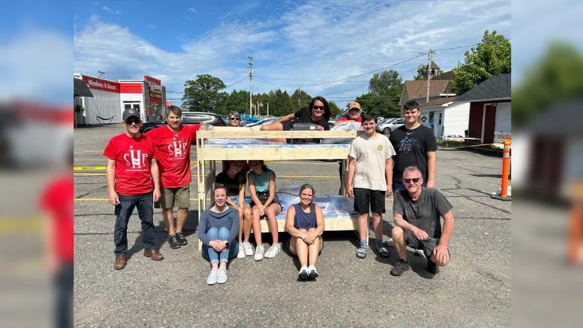 Saint John volunteers build 12 beds for children in need | 97.3 The Wave