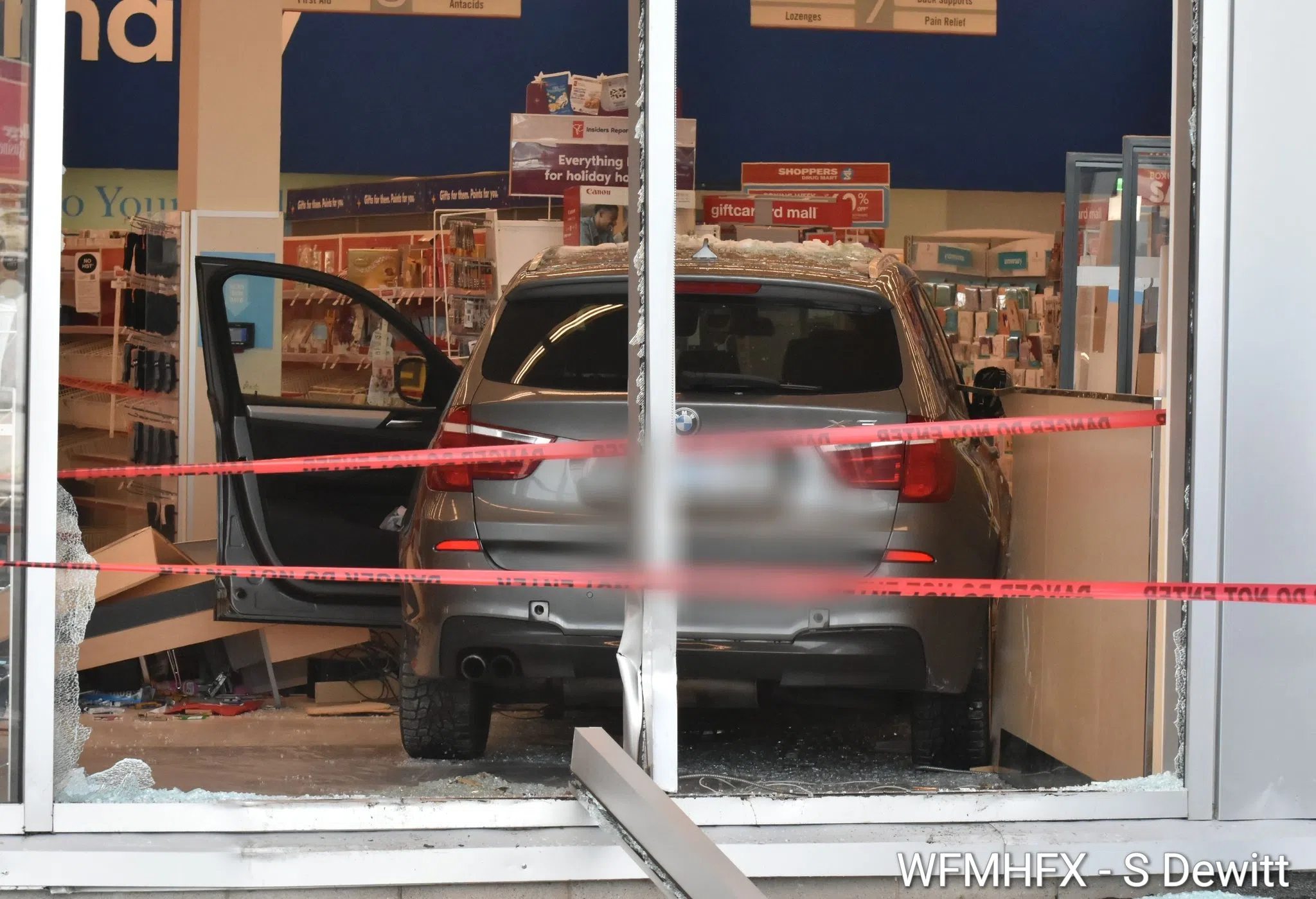Car crashes through drug store window in Sackville