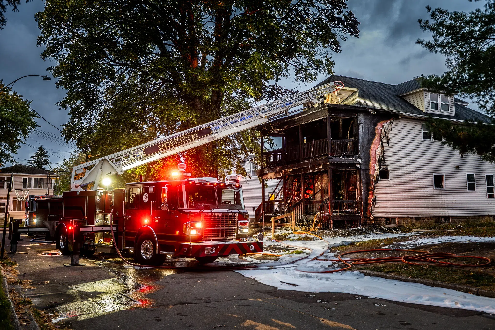 Two firefighters hurt as Moncton fire battles blaze, two residents rescued