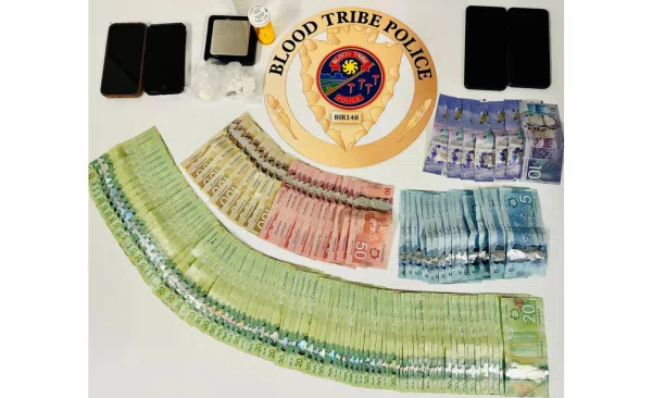 Money and drugs found in residence in Blood Tribe (Photo Credits - Blood Tribe Police Service)