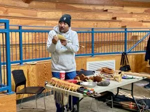 Demo and teaching of traditional Blackfoot games at the 2025 Siksika Artsdance, photo by William L Baliko