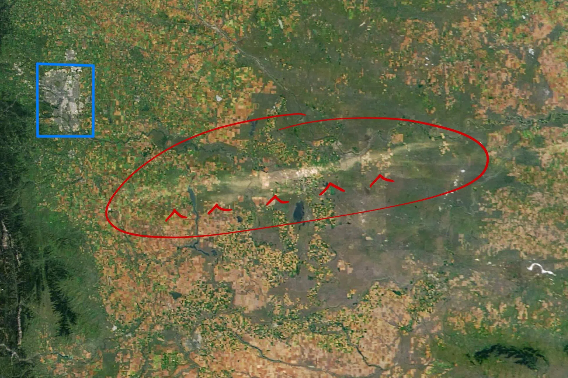 Satellite image with Calgary in Blue and the Hail Scar in Red from the NASA website