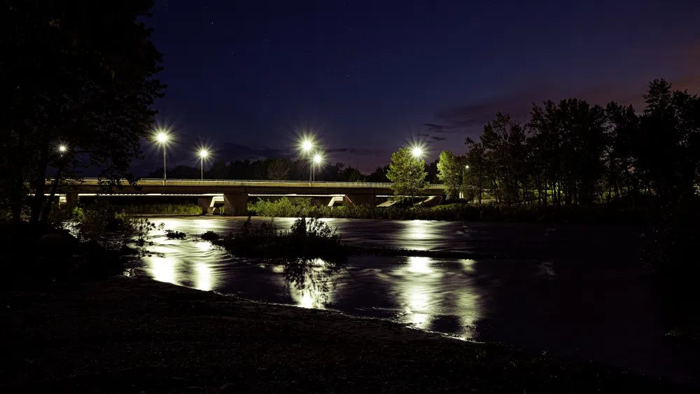 Sheep River flows under the night sky