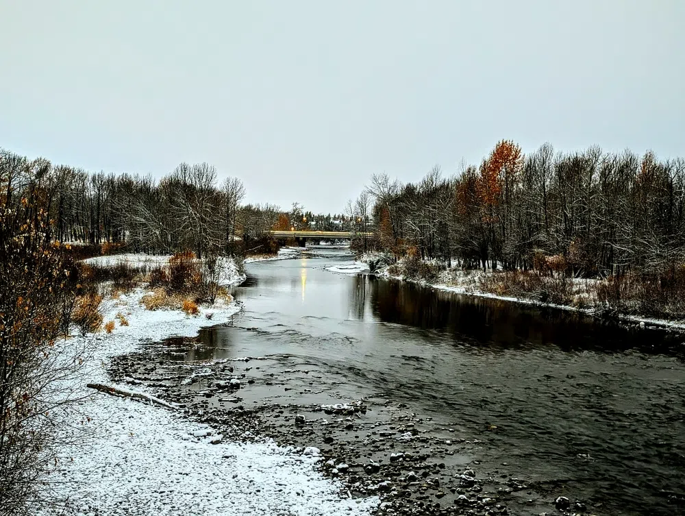 A chilly Sheep River flows beautifully through Okotoks