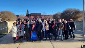 Portage College Staff, Lac La Biche Dignitaries and MNA Region one President Jim Cardinal at the Métis Flag raising ceremony on Portage College Campus grounds (Photo Credits - Portage College)