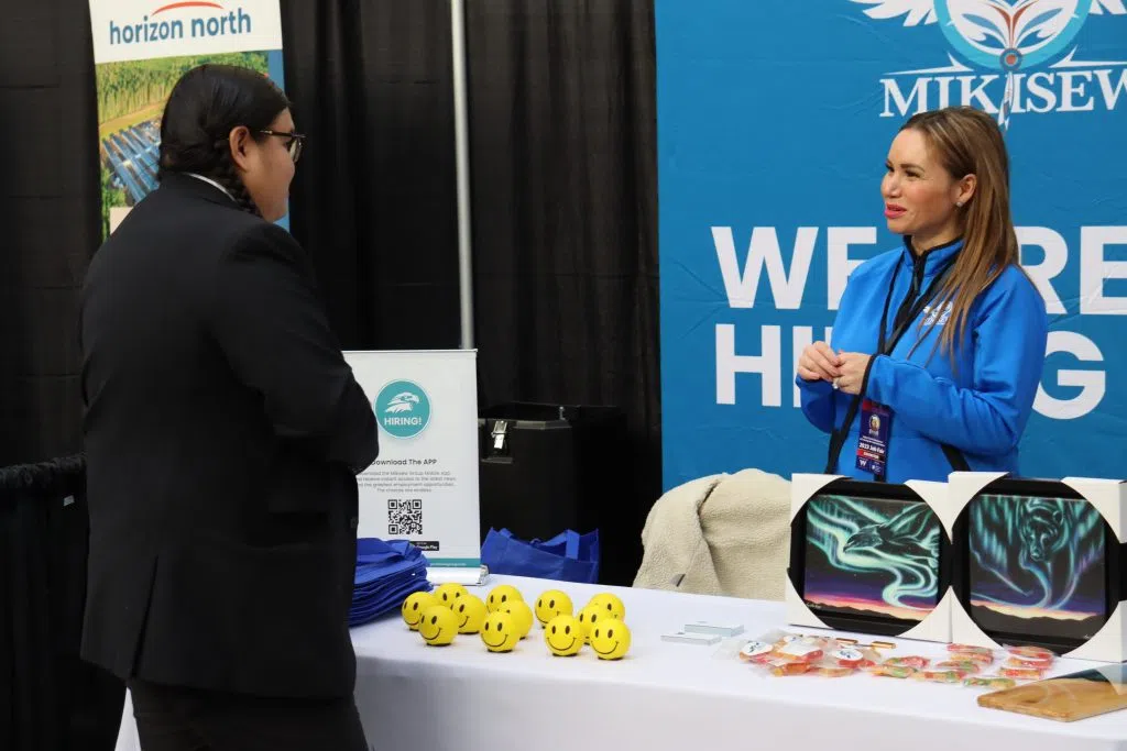 A job fair attendee inquiring about a job at the Tribal Chiefs Job Fair in West Edmonton Mall (Photo Credits - Daniel Barker-Tremblay)