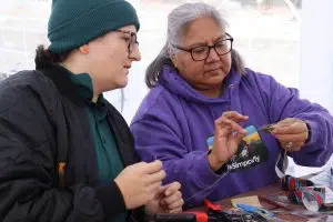 Parks Canada worker learning how to hand craft weaving in Jasper (Photo Credits - Daniel Barker-Tremblay)
