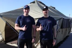 Lieutenant Darren Douglas (Right)  with fellow Spruce Grove Firefighter on the rooftop of the Spruce Grove Fire Hall (Photo Credits - Daniel Barker-Tremblay)