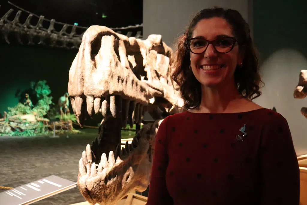 Constance Scarlett, President and CEO of the TELUS World of Science Edmonton inside the Dinosaur Exhibit (Photo Credits - Daniel Barker-Tremblay)