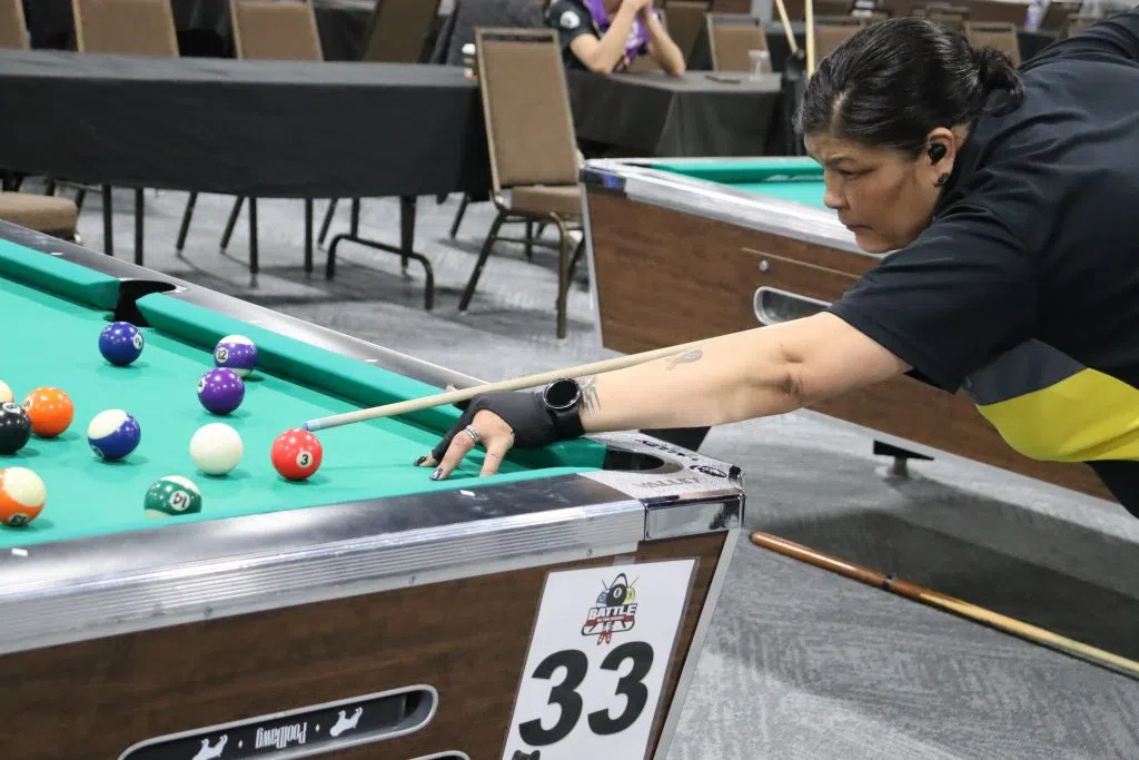Pool player competing in the Battle of the Bands Pool Championships in Red Deer Resort and Casino (Photo Credits - Daniel Barker-Tremblay)