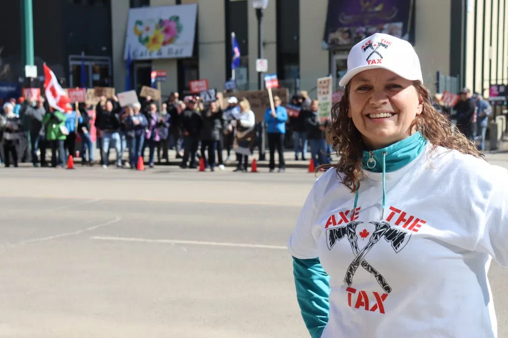 Benita Pederson, coordinator of the Carbon Tax Protest in Edmonton on 124 St near Jasper Ave (Photo Credits - Daniel Barker-Tremblay)